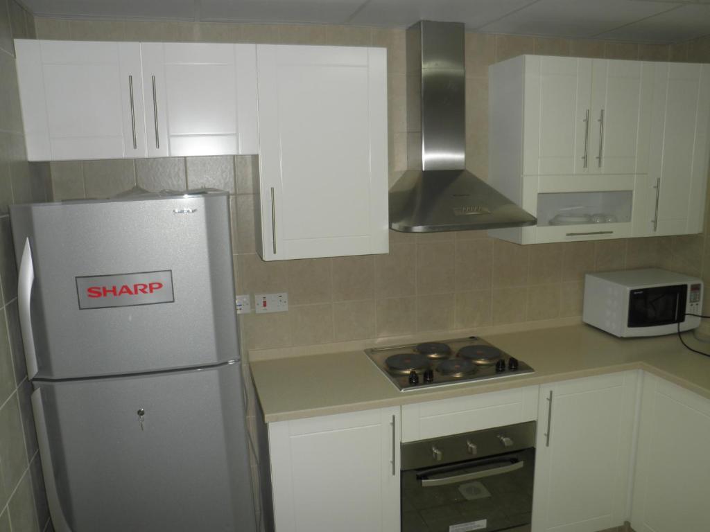 Hamasa Plaza Hotel y apartamentos Al Buraimi Habitación foto