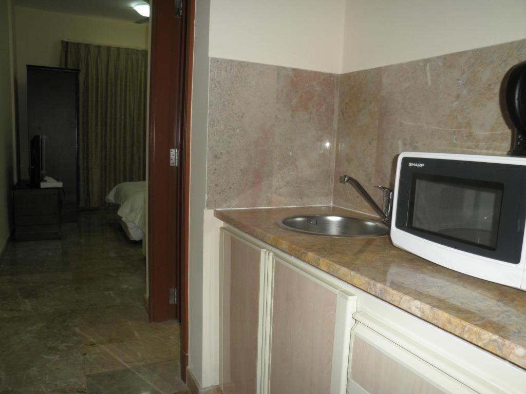 Hamasa Plaza Hotel y apartamentos Al Buraimi Habitación foto